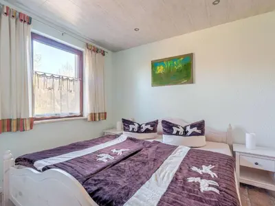Ein Bett oder Betten in einem Zimmer der Unterkunft Lakeside Comfort, Güntersberge