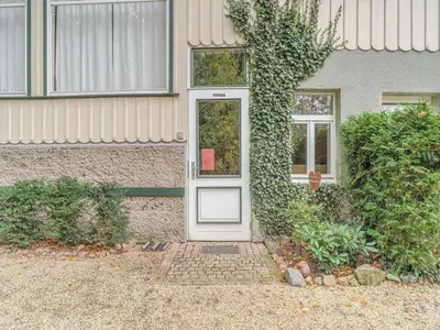Ein Garten an der Unterkunft Helle Wohnung mit Terrasse und Sauna