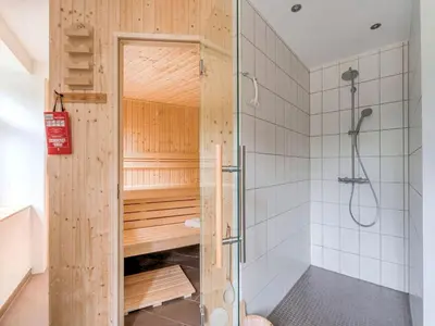 Ein Badezimmer in der Unterkunft Helle Wohnung mit Terrasse und Sauna