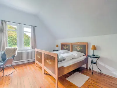 Ein Bett oder Betten in einem Zimmer der Unterkunft Gruppenhaus im Harz