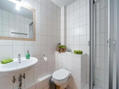 Ein Badezimmer in der Unterkunft Gruppenhaus im Harz