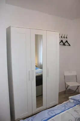 Ein Bett oder Betten in einem Zimmer der Unterkunft Moderne Ferienwohnung Anna 6a