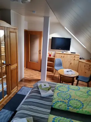 Ein Bett oder Betten in einem Zimmer der Unterkunft Ferienwohnung Anna