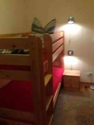 Ein Bett oder Betten in einem Zimmer der Unterkunft Ferienhaus 1 Am Eichenberg