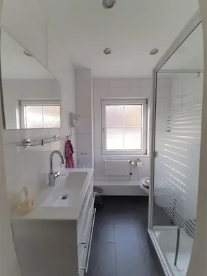 Ein Badezimmer in der Unterkunft Ferienwohnung Stricker 2/1, Typ B, Terrasse