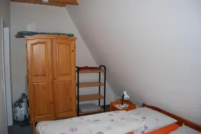 Ein Bett oder Betten in einem Zimmer der Unterkunft Ferienwohnung Stricker Typ A, Balkon 2/3