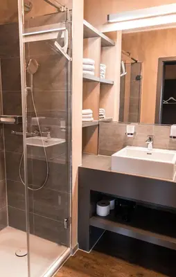 Ein Badezimmer in der Unterkunft StrandBerg's Die Hütten 550 üNN