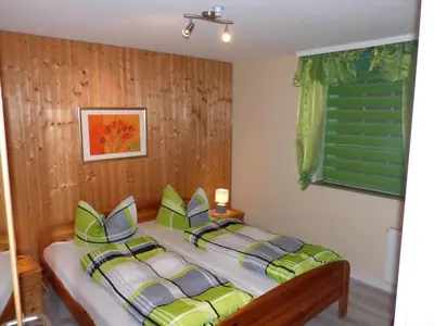 Ein Bett oder Betten in einem Zimmer der Unterkunft Haus Bambi