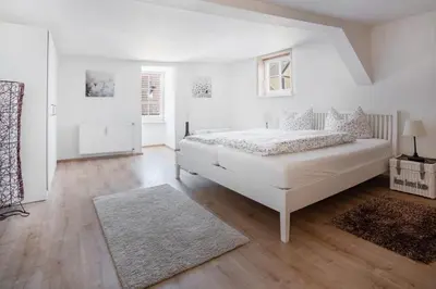 Ein Bett oder Betten in einem Zimmer der Unterkunft Apartment anno 1720