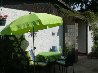 Ein Garten an der Unterkunft Ferienhaus ANNE