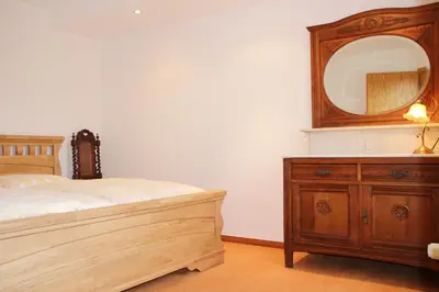 Ein Bett oder Betten in einem Zimmer der Unterkunft Die gute Stube