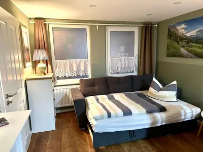 Ein Bett oder Betten in einem Zimmer der Unterkunft Pension Victoria Halberstadt