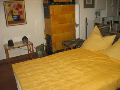 Ein Bett oder Betten in einem Zimmer der Unterkunft Blaues Häuschen