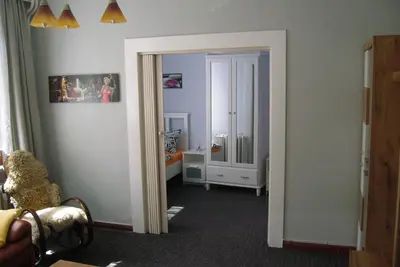 Ein Bett oder Betten in einem Zimmer der Unterkunft Ferienwohnung an der Brockenbahn