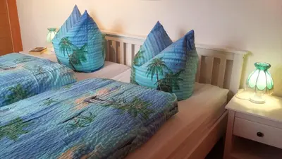 Ein Bett oder Betten in einem Zimmer der Unterkunft Harzurlaub Heyder