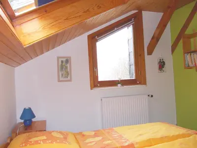 Ein Bett oder Betten in einem Zimmer der Unterkunft Ferienhaus Sequoia Hahnenklee
