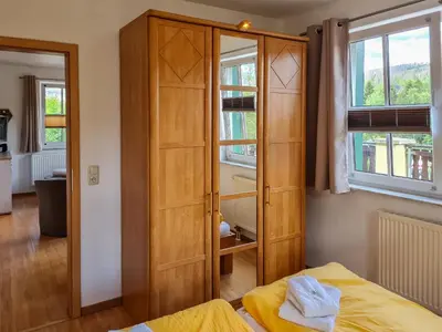 Ein Bett oder Betten in einem Zimmer der Unterkunft Ferienanlage Zum Wildbach Schierke