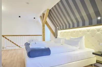 Ein Bett oder Betten in einem Zimmer der Unterkunft Sonnenresort Ettershaus
