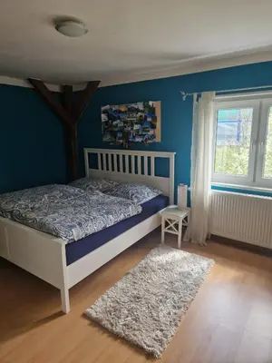 Ein Bett oder Betten in einem Zimmer der Unterkunft Fewo an der Bode