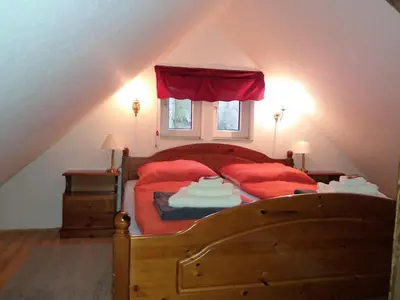 Ein Bett oder Betten in einem Zimmer der Unterkunft Hexenhaus am Waldesrand Wernigerode