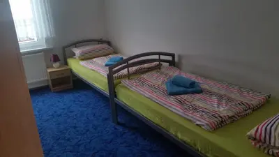 Ein Bett oder Betten in einem Zimmer der Unterkunft Ferienhaus Benneckenstein