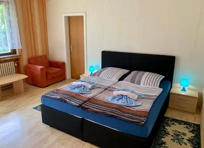 Ein Bett oder Betten in einem Zimmer der Unterkunft Ferienhaus Erika