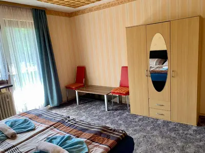 Ein Bett oder Betten in einem Zimmer der Unterkunft Ferienhaus Erika