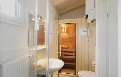 Ein Badezimmer in der Unterkunft Ferienhausdorf Thale