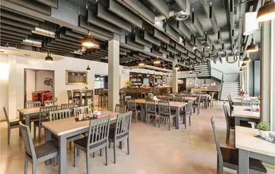 Ein Restaurant oder anderes Speiselokal in der Unterkunft Ferienhausdorf Thale