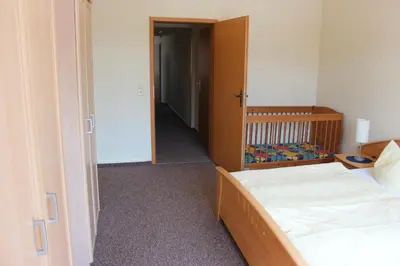 Ein Bett oder Betten in einem Zimmer der Unterkunft Ferienwohnungen Patsch