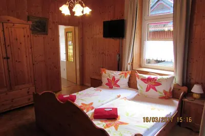 Ein Bett oder Betten in einem Zimmer der Unterkunft Gasthaus Koenigsruhe