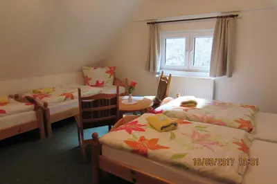 Ein Bett oder Betten in einem Zimmer der Unterkunft Gasthaus Koenigsruhe