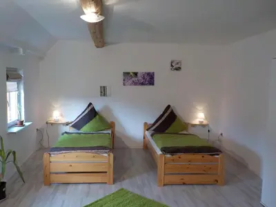 Ein Bett oder Betten in einem Zimmer der Unterkunft Ferienhaus Schock