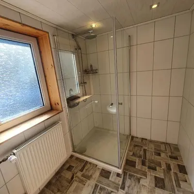 Ein Badezimmer in der Unterkunft B&B Waldcafe