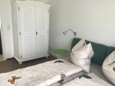 Ein Bett oder Betten in einem Zimmer der Unterkunft Harzer Grabenhaus