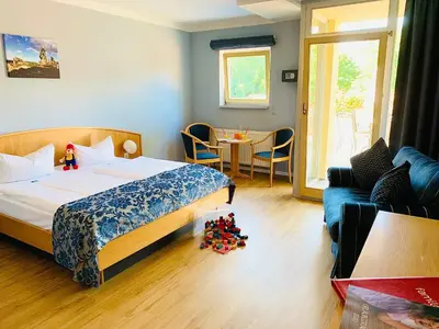 Ein Bett oder Betten in einem Zimmer der Unterkunft Family Club Harz