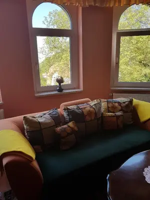 Ein Sitzbereich in der Unterkunft Haus Andrea