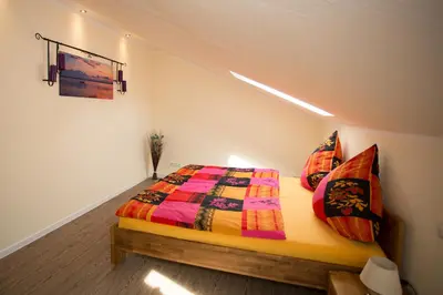 Ein Bett oder Betten in einem Zimmer der Unterkunft Ferienhaus Gottersitz