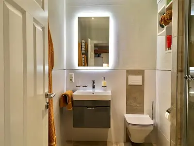 Ein Badezimmer in der Unterkunft Schöne Ferienwohnung am Mathildenbrunnen