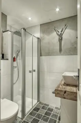 Ein Badezimmer in der Unterkunft HOME Suites Deluxe mit Sauna