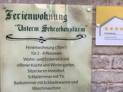 Ein Zertifikat, Auszeichnung, Logo oder anderes Dokument, das in der Unterkunft Ferienwohnung unterm Schreckensturm ausgestellt ist