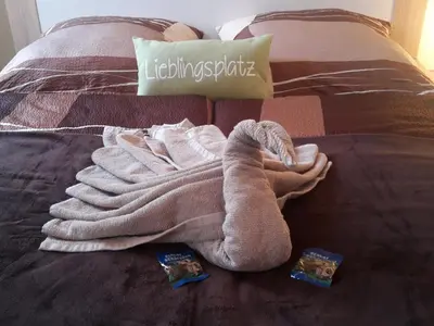 Ein Bett oder Betten in einem Zimmer der Unterkunft Ferienwohnungen an der Wassermühle