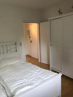 Ein Bett oder Betten in einem Zimmer der Unterkunft Ferienwohnung Wandervogel