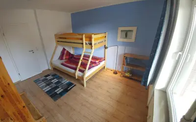 Ein Bett oder Betten in einem Zimmer der Unterkunft Ferienwohnung BöseHansen
