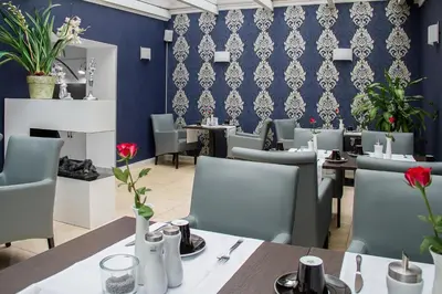 Ein Sitzbereich in der Unterkunft Haus Hotel & Pension Villa Laluna