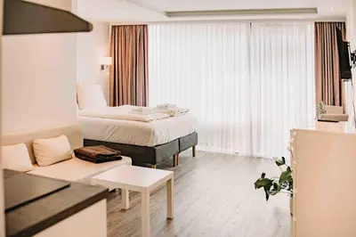Ein Bett oder Betten in einem Zimmer der Unterkunft Haus Vier Jahreszeiten am See HS 939