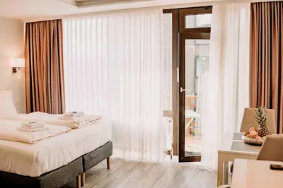 Ein Bett oder Betten in einem Zimmer der Unterkunft Haus Vier Jahreszeiten am See HS 939