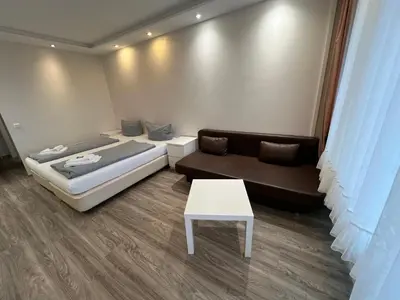 Ein Bett oder Betten in einem Zimmer der Unterkunft Haus Vier Jahreszeiten am See HS 582
