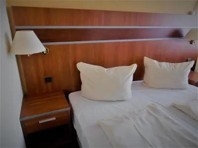 Ein Bett oder Betten in einem Zimmer der Unterkunft Haus Vier Jahreszeiten am See HS 581