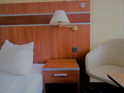 Ein Bett oder Betten in einem Zimmer der Unterkunft Haus Vier Jahreszeiten am See HS 581
